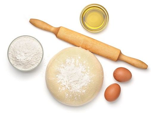 Rolling pin and bread dough